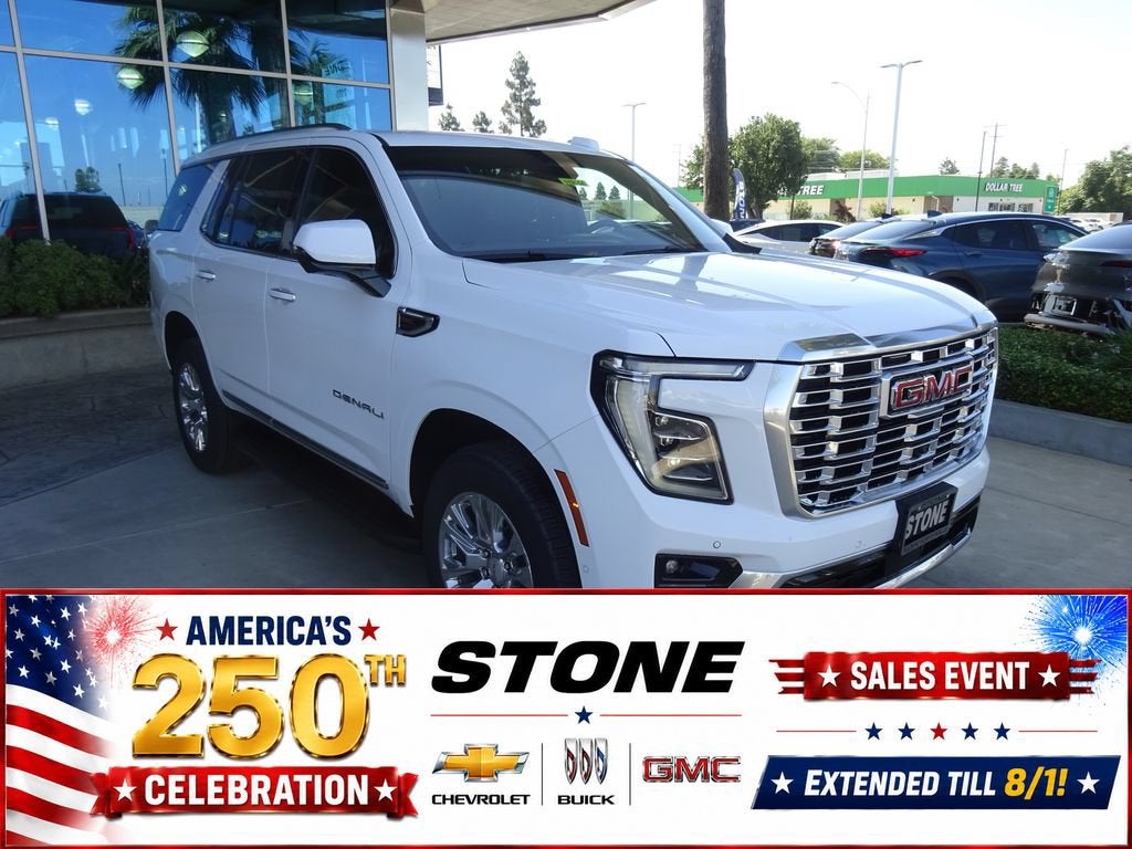 2026 GMC Yukon Denali in Summit White — front three-quarter view