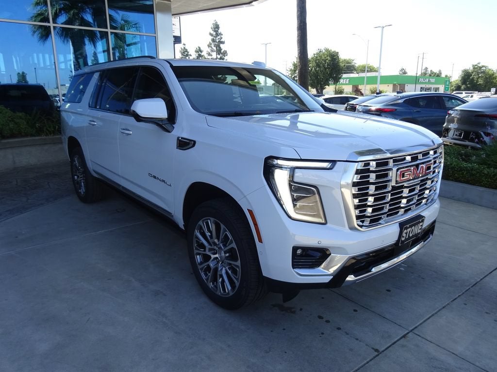 2026 GMC Yukon XL Denali in Glacier White Tricoat — front three-quarter view