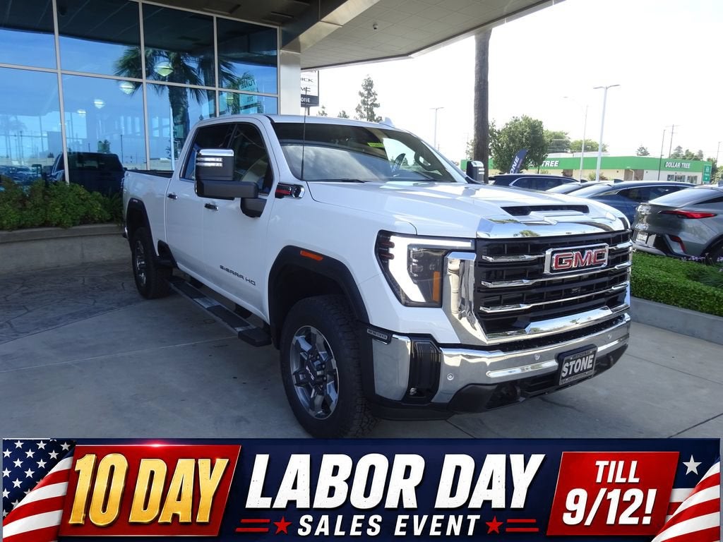 2026 GMC Sierra 2500 HD SLT in Summit White — front three-quarter view