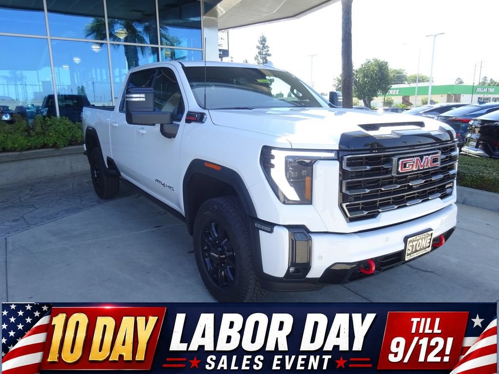 2026 GMC Sierra 2500 HD AT4 in Summit White — front three-quarter view