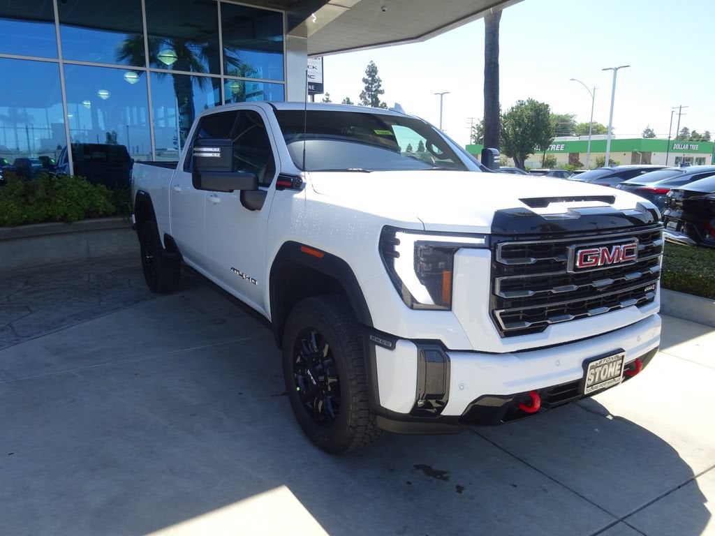 2026 GMC Sierra 2500 HD AT4 in Summit White — front three-quarter view