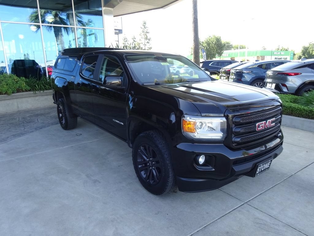 2018 GMC Canyon 4WD SLE in Onyx Black — front three-quarter view