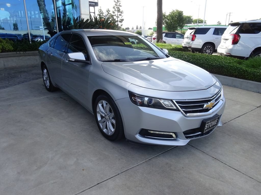 2018 Chevrolet Impala LT in Silver Ice Metallic — front three-quarter view