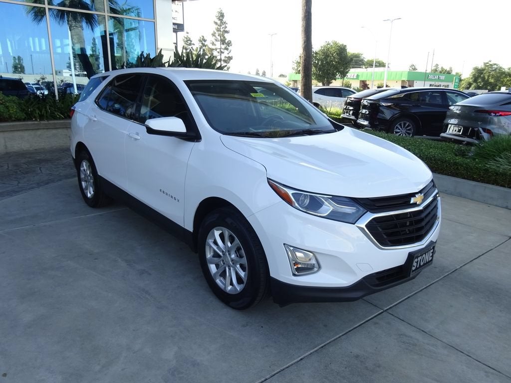 2018 Chevrolet Equinox LT in Summit White — front three-quarter view