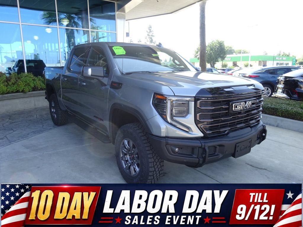 2026 GMC Sierra 1500 AT4X in Sterling Metallic — front three-quarter view
