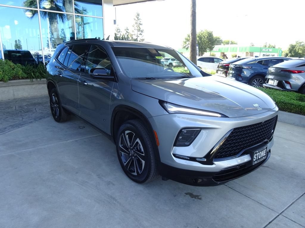 2026 Buick Enclave Sport Touring in Moonstone Gray Metallic — front three-quarter view